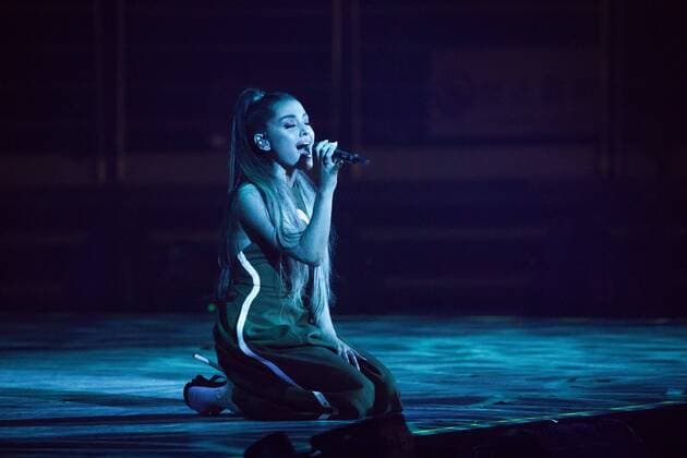 --FILE--American singer and actress Ariana Grande performs at a concert in Guangzhou city, south China s Guangdong province, 30 August 2017. Ariana Grande heats up concert in south China s Guangzhou  pbu674612_05
