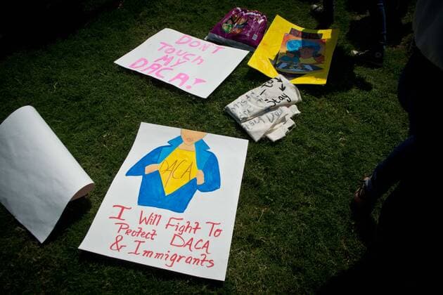 September 5, 2017 - U.S. - Marla Brose -- These are some of the signs held as hundreds of University of New Mexico students, staff and faculty march through around campus, chanting in support of immigrants and DACA students who may be affected by President Trump s proposed policy changes, Tuesday, Sept. 5, 2017, in Albuquerque, N.M. U.S. - ZUMAab1_ 20170905_zaf_ab1_021 Copyright: xAlbuquerquexJournalx