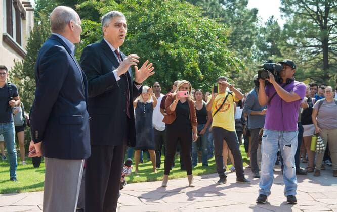 September 5, 2017 - U.S. - Marla Brose -- UNM interim president Chaouki Abdallah, second from left, speaks to hundreds of University of New Mexico students, staff and faculty, who marched to the UNM president s office chanting in support of immigrants and DACA students who may be affected by President Trump s proposed policy changes, Tuesday, Sept. 5, 2017, in Albuquerque, N.M. Abdallah offered his support. Standing next to Abdallah is Paul Roth, chancellor for Health Sciences. U.S. - ZUMAab1_ 20170905_zaf_ab1_022 Copyright: xAlbuquerquexJournalx