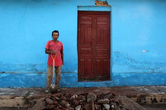 (170909) -- CHIAPAS, Sept. 9, 2017 -- A man stands outside his damaged house after an earthquake in Chiapa de Corzo of Chiapas state Sept. 8, 2017. The 8.2 magnitude quake rocking Mexico Thursday night has left at least 58 people dead, Mexico s national earthquake service said on Friday. ) (jg) (fnc) (da) MEXICO-EARTHQUAKE-AFTERMATH STR 