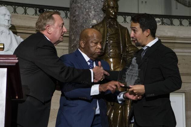 Sep 12, 2017 - Washington, District Of Columbia, U.S. - DONALD CARLSON, chairman of the board of the United States Capitol Historical Society (left) and Representative JOHN LEWIS (Democrat-Georgia) (center) present LIN-MANUEL MIRANDA with the 2017 Freedom Award from the United States Capitol Historical Society (USCHS) at the United States Capitol. Washington U.S.  - ZUMA 20170912_mda_e113_005 Copyright: xAlexxEdelmanx