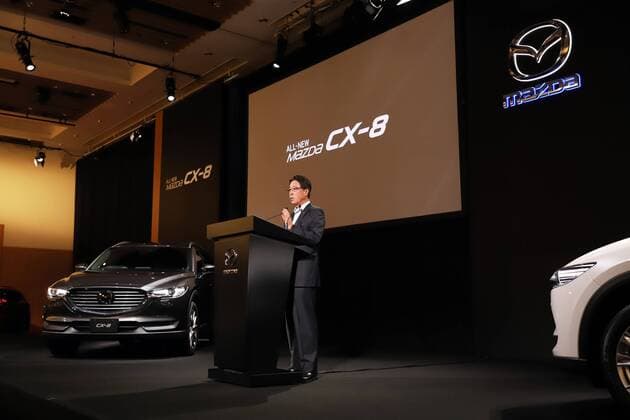 September 14, 2017, Tokyo, Japan - Japan s automaker Mazda president Masamichi Kogai introduces the new sports utility vehicle (SUV) CX-8 in Tokyo on Thursday, September 14, 2017. The new crossover SUV has a turbo charged 2.2-litre diesel engine to drive three-row seats roomy body.  (lwxa013602)
