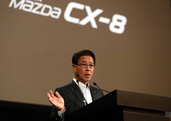 September 14, 2017, Tokyo, Japan - Japan s automaker Mazda president Masamichi Kogai introduces the new sports utility vehicle (SUV) CX-8 in Tokyo on Thursday, September 14, 2017. The new crossover SUV has a turbo charged 2.2-litre diesel engine to drive three-row seats roomy body.  (lwxa013603)