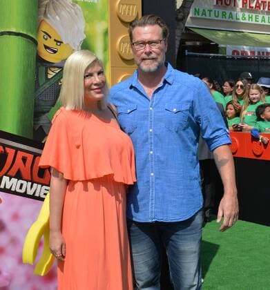 Actors Tori Spelling and Dean McDermott attend the premiere of the animated comedy The Lego Ninjago Movie at the Regency Village Theatre in the Westwood section of Los Angeles on September 16, 2017. Storyline: Six young ninjas are tasked with defending their island home, called Ninjago. By night, they re gifted warriors, using their skills and awesome fleet of vehicles to fight villains and monsters. By day, they re ordinary teens struggling against their greatest enemy: high school.  LAP2017091627 JIMxRUYMEN
