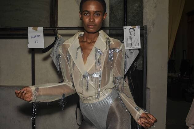 Italy: Grinko backstage at MFW S S 2018 A model is seen backstage ahead of the Sergei Grinko show during Milan Fashion Week Spring summer2018  GaetanoxPiazzolla