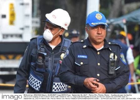 September 21, 2017 - Mexico City, Mexico, Mexico - A police are seen during the rescue work hoping to find a person alive under rubble for the 7.1 magnitude earthquake occurred, at lest 273 people has confirmed dead on September 21, 2017 in Mexico City, Mexico Mexico City Mexico  - ZUMAn230 20170921_zaa_n230_129 Copyright: xCarlosxTischlerx