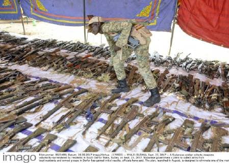 (170923) -- NYALA (SUDAN), Sept. 23, 2017 -- A Sudanese soldier collects weapons voluntarily surrendered by residents in South Darfur State, Sudan, on Sept. 23, 2017. Sudanese government s plant to collect arms from local residents and armed groups in Darfur has gained initial results, officials have said. The plan, launched in August, is designed to eliminate one of the main causes of instability in the war-torn region. ) SUDAN-SOUTH DARFUR-WEAPONS-SURRENDER MohamedxKhidir 