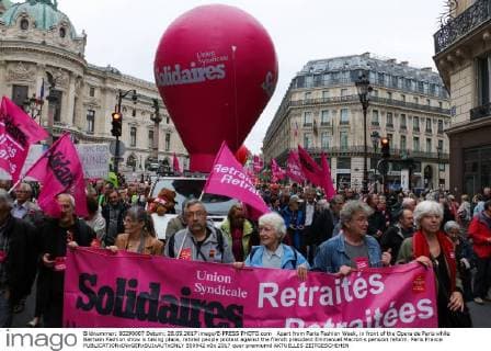 Apart from Paris Fashion Week, in front of the Opera de Paris while Balmain Fashion show is taking place, retired people protest against the french president Emmanuel Macron s pension reform. Paris France  550942