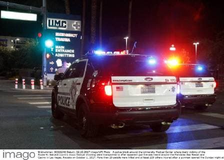 A police block around the University Medical Center where many victims of the Route 91 Harvest country music festival shooting were transported to after apparent gun fire was heard around the Mandalay Bay Resort and Casino in Las Vegas, Nevada on October 1, 2017. More than 20 people were killed and at least 100 others injured after a gunman opened fire Sunday night at a country music festival opposite the Mandalay Bay hotel and resort on the Las Vegas Strip, authorities said.  LAV2017100221 JAMESxATOA
