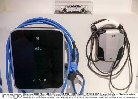 MOSCOW, RUSSIA - OCTOBER 2, 2017: Schneider Electric (L) and ABL charging stations for electric cars on display at the Moscow Tesla Club unofficial dealership centre in Moscow s Kutuzovsky Prospekt Street. Sergei Fadeichev TASS  TS062B94