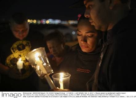 (171003) -- LAS VEGAS, Oct. 3, 2017 -- People attend a candle light vigil to mourn the victims of a mass shooting in Las Vegas, the United States, on Oct. 2, 2017. At least 59 people were killed and 527 others wounded after a gunman opened fire Sunday on a concert in Las Vegas in the U.S. state of Nevada, the deadliest mass shooting in modern U.S. history. ) (zy) U.S.-LAS VEGAS-SHOOTING-MOURNING WangxYing 