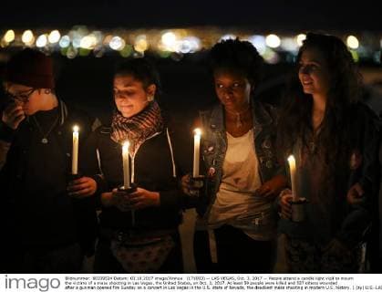 (171003) -- LAS VEGAS, Oct. 3, 2017 -- People attend a candle light vigil to mourn the victims of a mass shooting in Las Vegas, the United States, on Oct. 2, 2017. At least 59 people were killed and 527 others wounded after a gunman opened fire Sunday on a concert in Las Vegas in the U.S. state of Nevada, the deadliest mass shooting in modern U.S. history. ) (zy) U.S.-LAS VEGAS-SHOOTING-MOURNING WangxYing 
