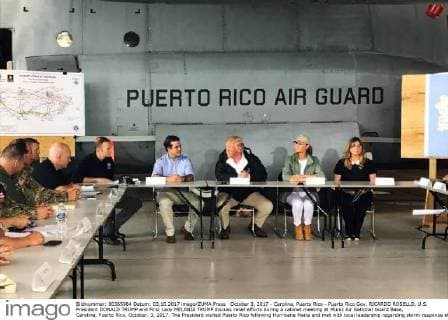 October 3, 2017 - Carolina, Puerto Rico - Puerto Rico Gov. RICARDO ROSELLO, U.S. President DONALD TRUMP and First Lady MELANIA TRUMP discuss relief efforts during a cabinet meeting at Muniz Air National Guard Base, Carolina, Puerto Rico, October. 3, 2017. The President visited Puerto Rico following Hurricane Maria and met with local leadership regarding storm response efforts. Carolina Puerto Rico - ZUMAz03_ 20171003_shz_z03_229 Copyright: xMichellexAlvarez-Reax
