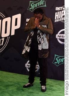 Rapper Tee Grizzley arrives at he 2017 BET Hip Hop award show at the Fillmore Miami Beach, Jackie Gleason Theater, Miami Beach, Florida, October 6, 2017.  MIA20171006119 GARYxIxROTHSTEIN