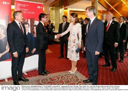 Japanese Foreign Minister Taro Kono (C-L) and Her Royal Highness the Crown Princess Mary Elizabeth Donaldson (C-R-), shake hands during a business seminar at Hotel Gajoen Tokyo on October 11, 2017, Tokyo, Japan. The Danish Crown Prince Couple hope to cement business relationships between Japan and Denmark during their visit celebrating 150 years of Diplomatic relations between the two countries.  (gxta_denmarkroyalvisitjpn017)