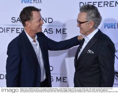 Cast member Greg Kinnear (L) and author Ron Hall mingle during the premiere of the motion picture drama Some Kind of Different as Me at the Westwood Village Theatre in Los Angeles on October 12, 2017. Storyline: Based on the inspiring true story of international art dealer Ron Hall, who must befriend a dangerous homeless man in order to save his struggling marriage to his wife, a woman whose dreams will lead all three of them on the journey of their lives.  LAP2017101217 JIMxRUYMEN