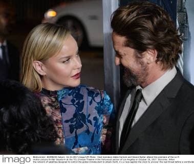 Cast members Abbie Cornish and Gerard Butler attend the premiere of the sci-fi motion picture thriller Geostorm at the TCL Chinese Theatre in the Hollywood section of Los Angeles on October 16, 2017. Storyline: When the network of satellites designed to control the global climate start to attack Earth, it s a race against the clock to uncover the real threat before a worldwide geostorm wipes out everything and everyone.  LAP2017101621 JIMxRUYMEN