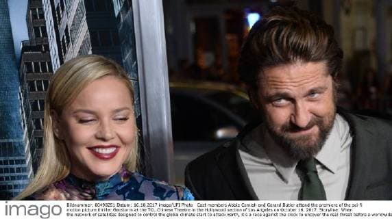 Cast members Abbie Cornish and Gerard Butler attend the premiere of the sci-fi motion picture thriller Geostorm at the TCL Chinese Theatre in the Hollywood section of Los Angeles on October 16, 2017. Storyline: When the network of satellites designed to control the global climate start to attack Earth, it s a race against the clock to uncover the real threat before a worldwide geostorm wipes out everything and everyone.  LAP2017101636 JIMxRUYMEN
