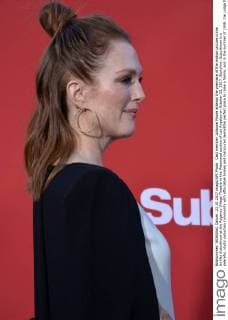 Cast member Julianne Moore attends the premiere of the motion picture crime thriller Suburbicon at the Regency Village Theatre in the Westwood section of Los Angeles on October 22, 2017. Storyline: Suburbicon is a peaceful, idyllic suburban community with affordable homes and manicured lawnsÉthe perfect place to raise a family, and in the summer of 1959, the Lodge family is doing just that. But the tranquil surface masks a disturbing reality, as husband and father Gardner Lodge (Matt.Damon) must navigate the townÕs dark underbelly of betrayal, deceit, and violence. This is a tale of.very flawed people making very bad choices. This is Suburbicon.  LAP2017102217 JIMxRUYMEN