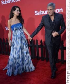 Director producer writer George Clooney and his wife, human rights attorney Amal Clooney attend the premiere of his new motion picture crime thriller Suburbicon at the Regency Village Theatre in the Westwood section of Los Angeles on October 22, 2017. Storyline: Suburbicon is a peaceful, idyllic suburban community with affordable homes and manicured lawnsÉthe perfect place to raise a family, and in the summer of 1959, the Lodge family is doing just that. But the tranquil surface masks a disturbing reality, as husband and father Gardner Lodge (Matt.Damon) must navigate the townÕs dark underbelly of betrayal, deceit, and violence. This is a tale of.very flawed people making very bad choices. This is Suburbicon.  LAP2017102226 JIMxRUYMEN