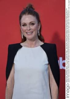 Cast member Julianne Moore attends the premiere of the motion picture crime thriller Suburbicon at the Regency Village Theatre in the Westwood section of Los Angeles on October 22, 2017. Storyline: Suburbicon is a peaceful, idyllic suburban community with affordable homes and manicured lawnsÉthe perfect place to raise a family, and in the summer of 1959, the Lodge family is doing just that. But the tranquil surface masks a disturbing reality, as husband and father Gardner Lodge (Matt.Damon) must navigate the townÕs dark underbelly of betrayal, deceit, and violence. This is a tale of.very flawed people making very bad choices. This is Suburbicon.  LAP2017102219 JIMxRUYMEN