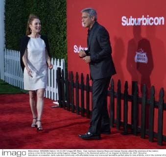Cast members Julianne Moore and George Clooney attend the premiere of the motion picture crime thriller Suburbicon at the Regency Village Theatre in the Westwood section of Los Angeles on October 22, 2017. Storyline: Suburbicon is a peaceful, idyllic suburban community with affordable homes and manicured lawnsÉthe perfect place to raise a family, and in the summer of 1959, the Lodge family is doing just that. But the tranquil surface masks a disturbing reality, as husband and father Gardner Lodge (Matt.Damon) must navigate the townÕs dark underbelly of betrayal, deceit, and violence. This is a tale of.very flawed people making very bad choices. This is Suburbicon.  LAP2017102231 JIMxRUYMEN