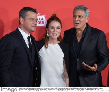 Cast members Matt Damon (L), Julianne Moore (C) and executive producer director George Clooney attend the premiere of the motion picture crime thriller Suburbicon at the Regency Village Theatre in the Westwood section of Los Angeles on October 22, 2017. Storyline: Suburbicon is a peaceful, idyllic suburban community with affordable homes and manicured lawnsÉthe perfect place to raise a family, and in the summer of 1959, the Lodge family is doing just that. But the tranquil surface masks a disturbing reality, as husband and father Gardner Lodge (Matt.Damon) must navigate the townÕs dark underbelly of betrayal, deceit, and violence. This is a tale of.very flawed people making very bad choices. This is Suburbicon.  LAP2017102243 JIMxRUYMEN