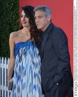 Director producer writer George Clooney and his wife, human rights attorney Amal Clooney attend the premiere of his new motion picture crime thriller Suburbicon at the Regency Village Theatre in the Westwood section of Los Angeles on October 22, 2017. Storyline: Suburbicon is a peaceful, idyllic suburban community with affordable homes and manicured lawnsEthe perfect place to raise a family, and in the summer of 1959, the Lodge family is doing just that. But the tranquil surface masks a disturbing reality, as husband and father Gardner Lodge (Matt.Damon) must navigate the towns dark underbelly of betrayal, deceit, and violence. This is a tale of.very flawed people making very bad choices. This is Suburbicon.  LAP2017102299 JIMxRUYMEN