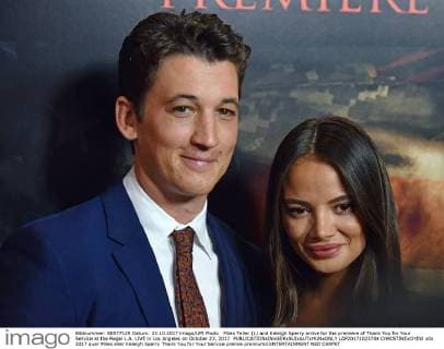 Miles Teller (L) and Keleigh Sperry arrive for the premiere of Thank You for Your Service at the Regal L.A. LIVE in Los Angeles on October 23, 2017.  LAP20171023704 CHRISTINExCHEW