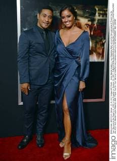 Actor Beulah Koale (L) and Meaghan Rath arrive for the premiere of Thank You for Your Service at the Regal L.A. LIVE in Los Angeles on October 23, 2017.  LAP20171023714 CHRISTINExCHEW