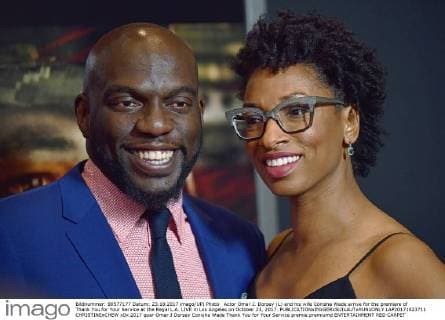 Actor Omar J. Dorsey (L) and his wife Conisha Wade arrive for the premiere of Thank You for Your Service at the Regal L.A. LIVE in Los Angeles on October 23, 2017.  LAP20171023711 CHRISTINExCHEW
