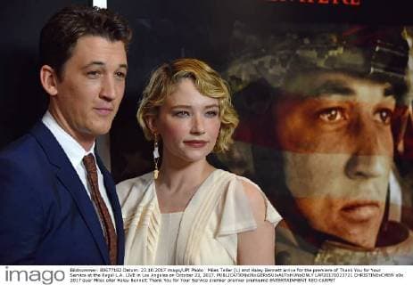 Miles Teller (L) and Haley Bennett arrive for the premiere of Thank You for Your Service at the Regal L.A. LIVE in Los Angeles on October 23, 2017.  LAP20171023721 CHRISTINExCHEW