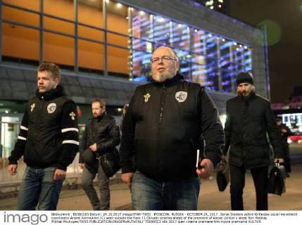 MOSCOW, RUSSIA - OCTOBER 24, 2017: Sorok Sorokov active Orthodox social movement coordinator Andrei Kormukhin (C) seen outside the Karo 11 Oktyabr cinema ahead of the premiere of Alexei Uchitel s latest film Matilda. Mikhail Pochuyev TASS  TS0665C3