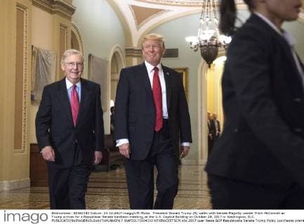 President Donald Trump (R) walks with Senate Majority Leader Mitch McConnell as Trump arrives for a Republican Senate luncheon meeting, at the U.S. Capitol Building on October 24, 2017 in Washington, D.C.  WAP20171024310 KEVINxDIETSCH
