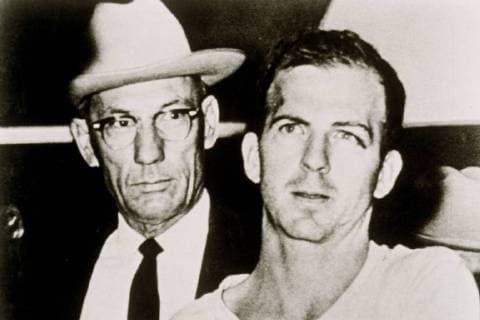 October 26, 2017 - FILE - The government is due to release Thursday more than 3,000 files about the assassination of former President John F. Kennedy. The files would be the last to be released by the National Archives under a 1992 law that ordered the government to make all remaining documents pertaining to the assassination public. There has long been a trove of conspiracy theories surrounding Kennedy s death in Dallas on Nov. 22, 1963, including doubts about whether assassin LEE HARVEY OSWALD acted alone, as the Warren Commission determined in its report the following year. Pictured: Nov 22, 1963 - Dallas, Texas, U.S. - JFK s murderer Lee Harvey Oswald just after being arrested. This 24 year-old former Marine, converted to Marxism, left the American Army in 1959 to defect to the USSR. There, he married a Russian woman, Marina, with who - ZUMAz03_ 20171026_shg_z03_305 Copyright: xJFKxCollectionx