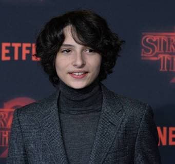 Cast member Finn Wolfhard attends the premiere of Netflix s Stranger Things Season 2 at the Regency Bruin Theatre in Los Angeles on October 26, 2017. Storyline: When a young boy disappears, his mother, a police chief, and his friends must confront terrifying forces in order to get him back.  LAP2017102676 JIMxRUYMEN