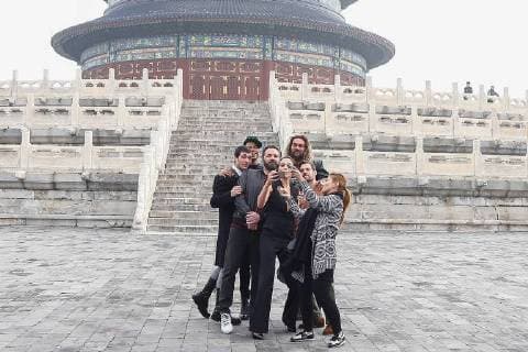(From left) American actor and singer Ezra Miller, stage actor Ray Fisher, actor and director Ben Affleck, Israeli actress and model Gal Gadot, American actor and model Jason Momoa, and British actor Henry Cavill take selfies as they visit the Temple of Heaven in heavy smog in Beijing, China, 27 October 2017. Gal Gadot leads co-stars of movie Justice League to visit Temple of Heaven in heavy smog in Beijing  pbu701405_13