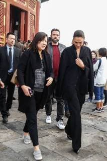 American actor and director Ben Affleck, back, and Israeli actress and model Gal Gadot, front right, visit the Temple of Heaven in heavy smog in Beijing, China, 27 October 2017. Gal Gadot leads co-stars of movie Justice League to visit Temple of Heaven in heavy smog in Beijing  pbu701405_20