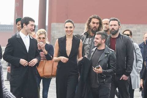 (From back left) American actor and singer Ezra Miller, Israeli actress and model Gal Gadot, American actor and model Jason Momoa, and actor and director Ben Affleck visit the Temple of Heaven in heavy smog in Beijing, China, 27 October 2017. Gal Gadot leads co-stars of movie Justice League to visit Temple of Heaven in heavy smog in Beijing  pbu701405_04