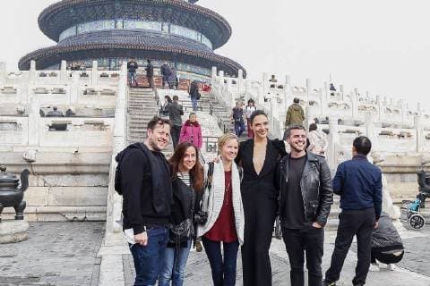 Israeli actress and model Gal Gadot, second right, poses for photos with fans as she visits the Temple of Heaven in heavy smog in Beijing, China, 27 October 2017. Gal Gadot leads co-stars of movie Justice League to visit Temple of Heaven in heavy smog in Beijing  pbu701405_29