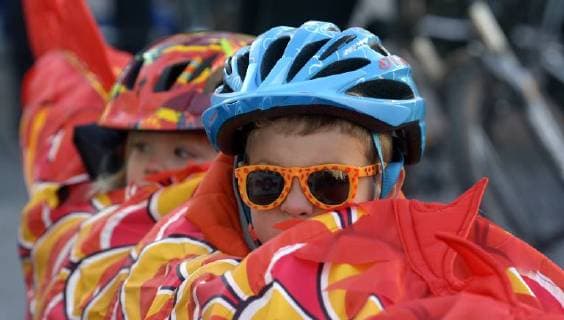 October 29, 2017 - U.S. - ASEC -- Amelia Prevost, 2, left, and her brother, Ayrton Prevost, 4, ride in bike trailer inside a dragon costume with parents Merideth and Guy Prevost, during the Day of the Tread bike ride at the Civic Plaza on Sunday, October 29, 2017. U.S. - ZUMAab1_ 20171029_zaf_ab1_005 Copyright: xGregxSorberx