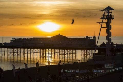 October 30, 2017 - Brighton, East Sussex, United Kingdom - Brighton, UK. Members of the public take a ride on the Brighton Zipwire attraction as the sun sets behind the Brighton Palace pier in Brighton and Hove. Brighton United Kingdom  - ZUMAl94_ 20171030_zaf_l94_023 Copyright: xHugoxMichielsx