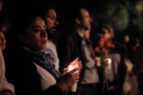 (171102) -- MEXICO CITY, Nov. 2, 2017 -- People hold candles during a procession in memory of the victims of the earthquake of Sept. 19, on the Day of the Dead, in Mexico City, capital of Mexico, Nov. 1, 2017. Montserrat Lopez) (zjy) MEXICO-MEXICO CITY-DAY OF THE DEAD e MontserratxLopez 