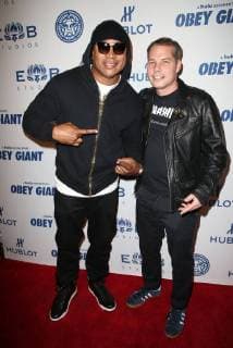 LOS ANGELES CA NOVEMBER 7 L L Cool J Shepard Fairey at Photo Op For Hulu s Obey Giant at the The Theatre at Ace Hotel in Los Angeles California on November 7 2017 Copyright: xFayexSadoux