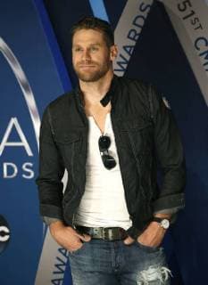 Chase Rice walks the red carpet as he arrives for the 51st Annual Country Music Association Awards on November 8, 2017 at the Bridgestone Arena in Nashville.  NAS20171108119 JOHNxSOMMERSxII
