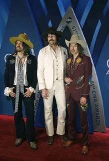 Midland walks the red carpet as they arrive for the 51st Annual Country Music Association Awards on November 8, 2017 at the Bridgestone Arena in Nashville.  NAS20171108128 JOHNxSOMMERSxII