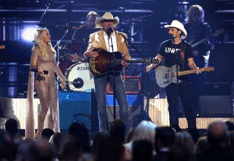 Alan Jackson (C), Carrie Underwood and Brad Paisley perform at the 51st Annual Country Music Association Awards on November 8, 2017 at the Bridgestone Arena in Nashville.  NAS20171108340 JOHNxSOMMERSxII