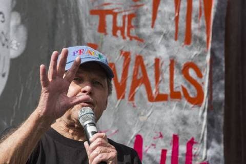 November 12, 2017 - Nogales, Sonora, U.S. - Nogales, Sonora Mexico - 12 November 2017 - Farther Roy Bourgeois speaks at a rally held at the U.S.-Mexico border fence to remember migrants who have died trying to cross the border. Farther Bourgois is the founder of the School of the Americas Watch, which organized the rally. Nogales U.S. - ZUMAw66_ 20171112_zaf_w66_005 Copyright: xJimxWestx