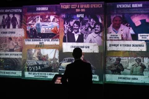 NOVOSIBIRSK, RUSSIA - NOVEMBER 12, 2017: A person views a multimedia exhibition at the Russia â€“ My History historical park opened in Oktyabrsky District. Kirill Kukhmar TASS  TS068C78