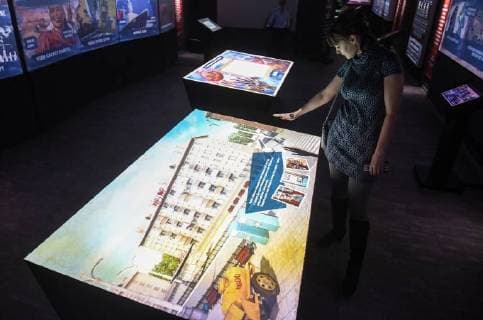 NOVOSIBIRSK, RUSSIA - NOVEMBER 12, 2017: A person views a multimedia exhibition at the Russia â€“ My History historical park opened in Oktyabrsky District. Kirill Kukhmar TASS  TS068C89
